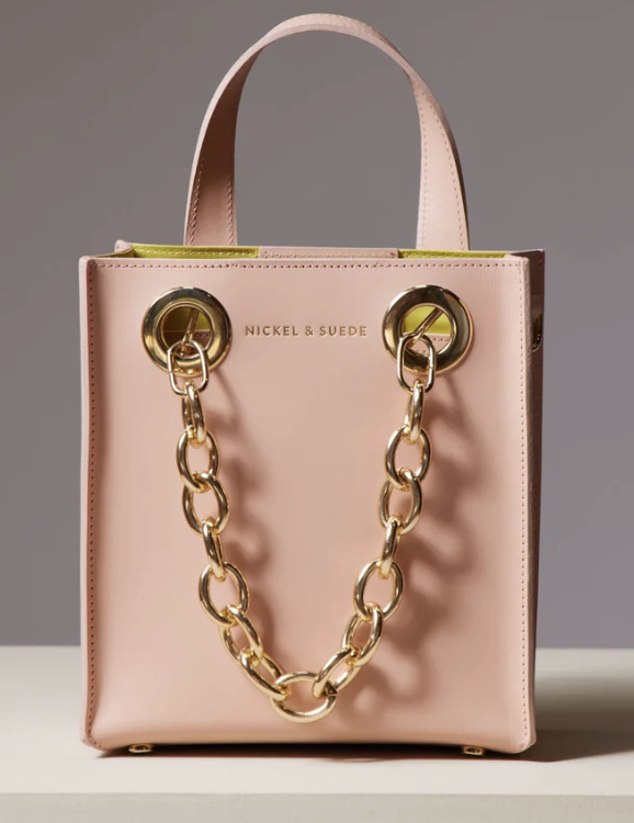 Pink handbag with gold chain handles