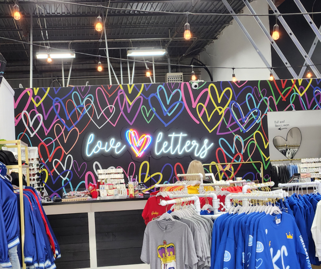 A sporty women's boutique with lots of blue clothing